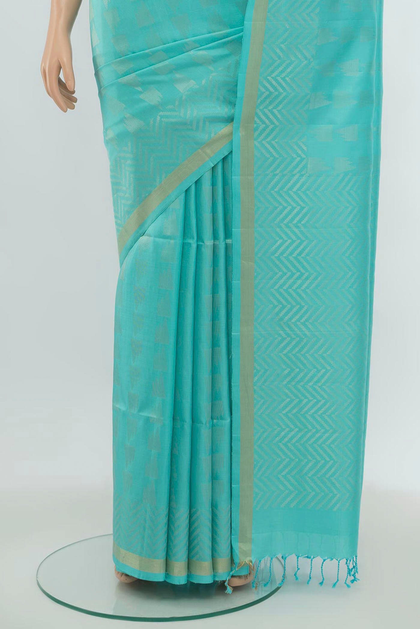 Pleats and pallu of Sky Blue Soft Silk Saree with Zari Butta on the body and Silk Border. 