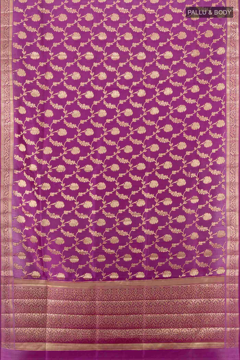 Flat view of Purple Banarasi Raw Silk Saree with Zari Butta on the body and Silk Border. 