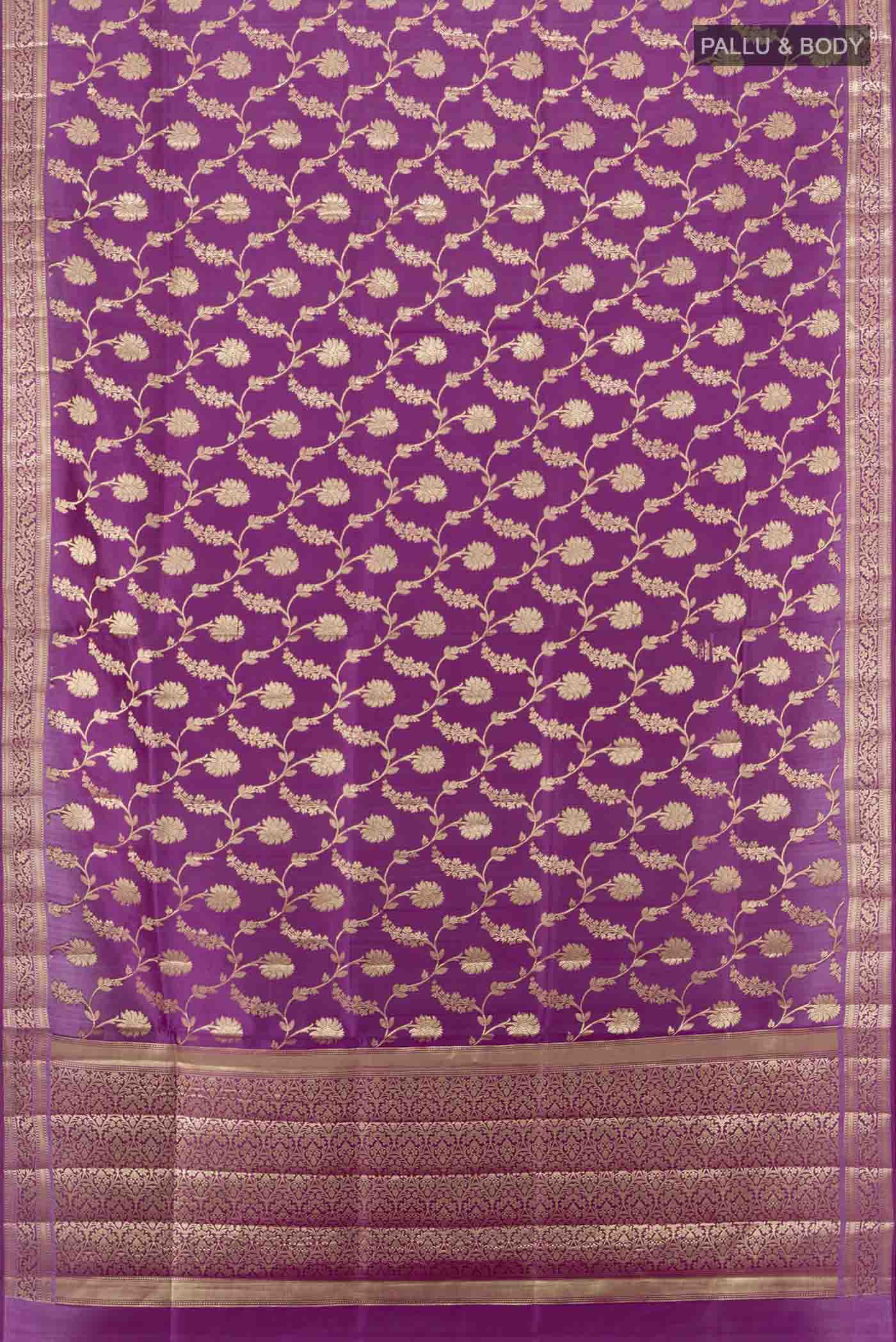 Flat view of Purple Banarasi Raw Silk Saree with Zari Butta on the body and Silk Border. 