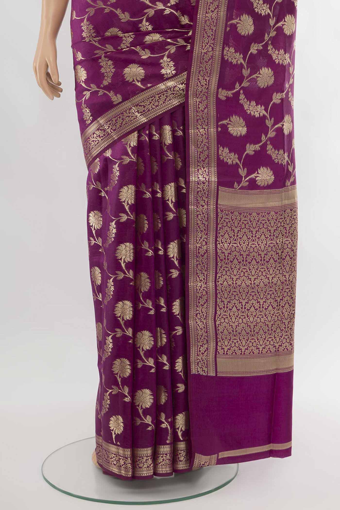 Pleats and pallu of Purple Banarasi Raw Silk Saree with Zari Butta on the body and Silk Border. 