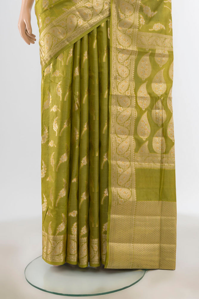 Pleats and pallu of Light Green Banarasi Raw Silk Saree with Zari Butta on the body and Silk Border. 