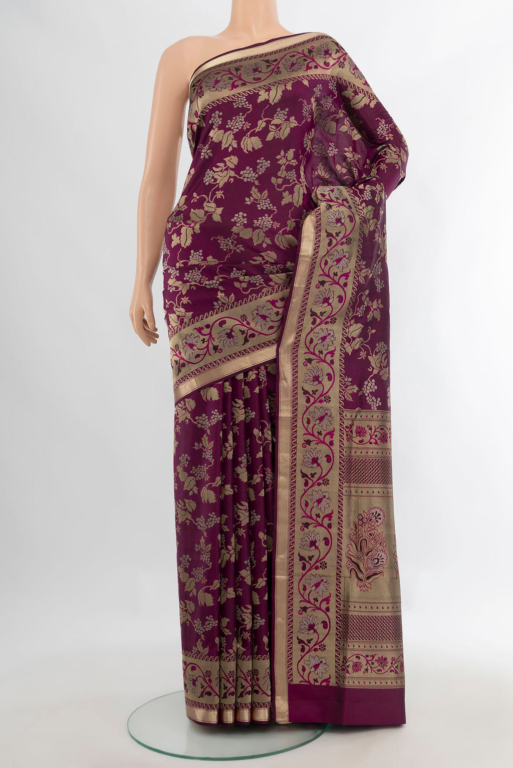 Pure Silk Magenta Soft Saree with Zari Brocade on the body and Zari Border.  displayed on a mannequin