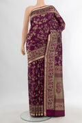 Pure Silk Magenta Soft Saree with Zari Brocade on the body and Zari Border.  displayed on a mannequin