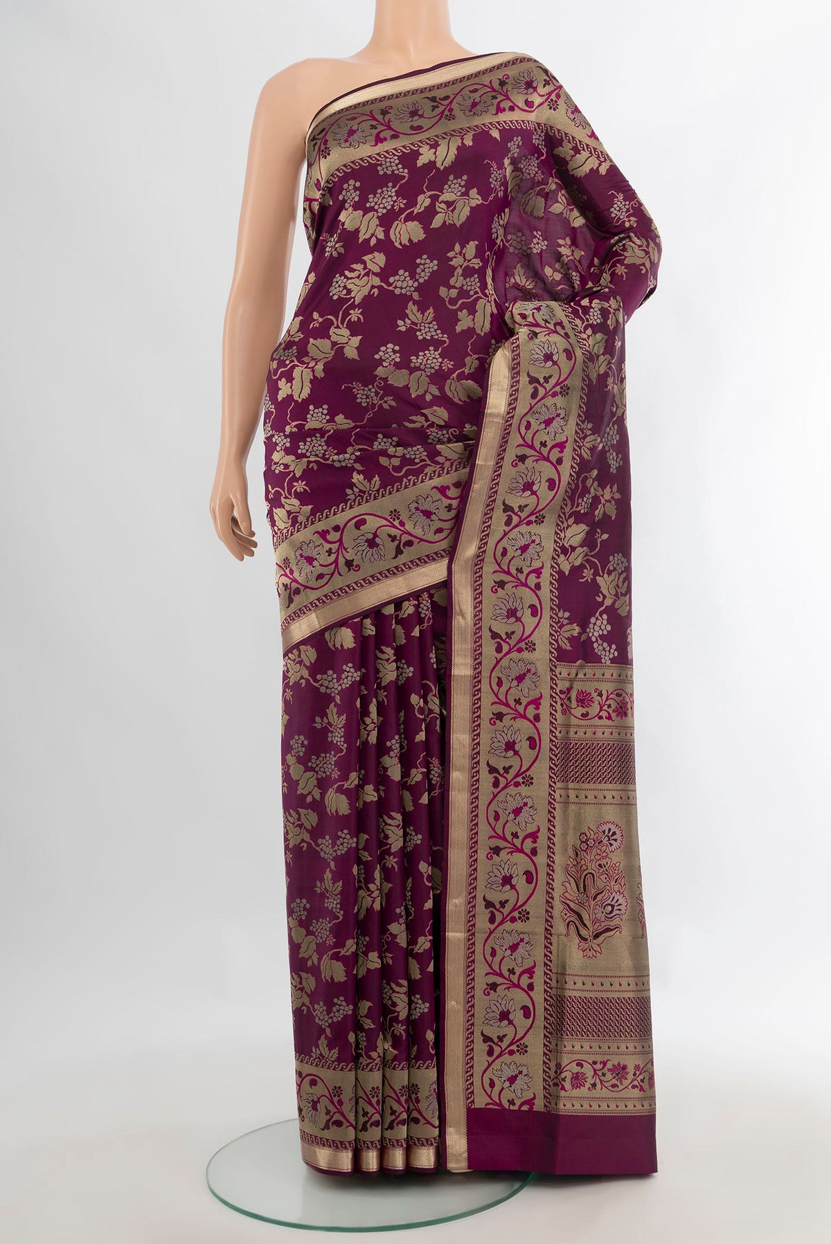 Pure Silk Magenta Soft Saree with Zari Brocade on the body and Zari Border.  displayed on a mannequin