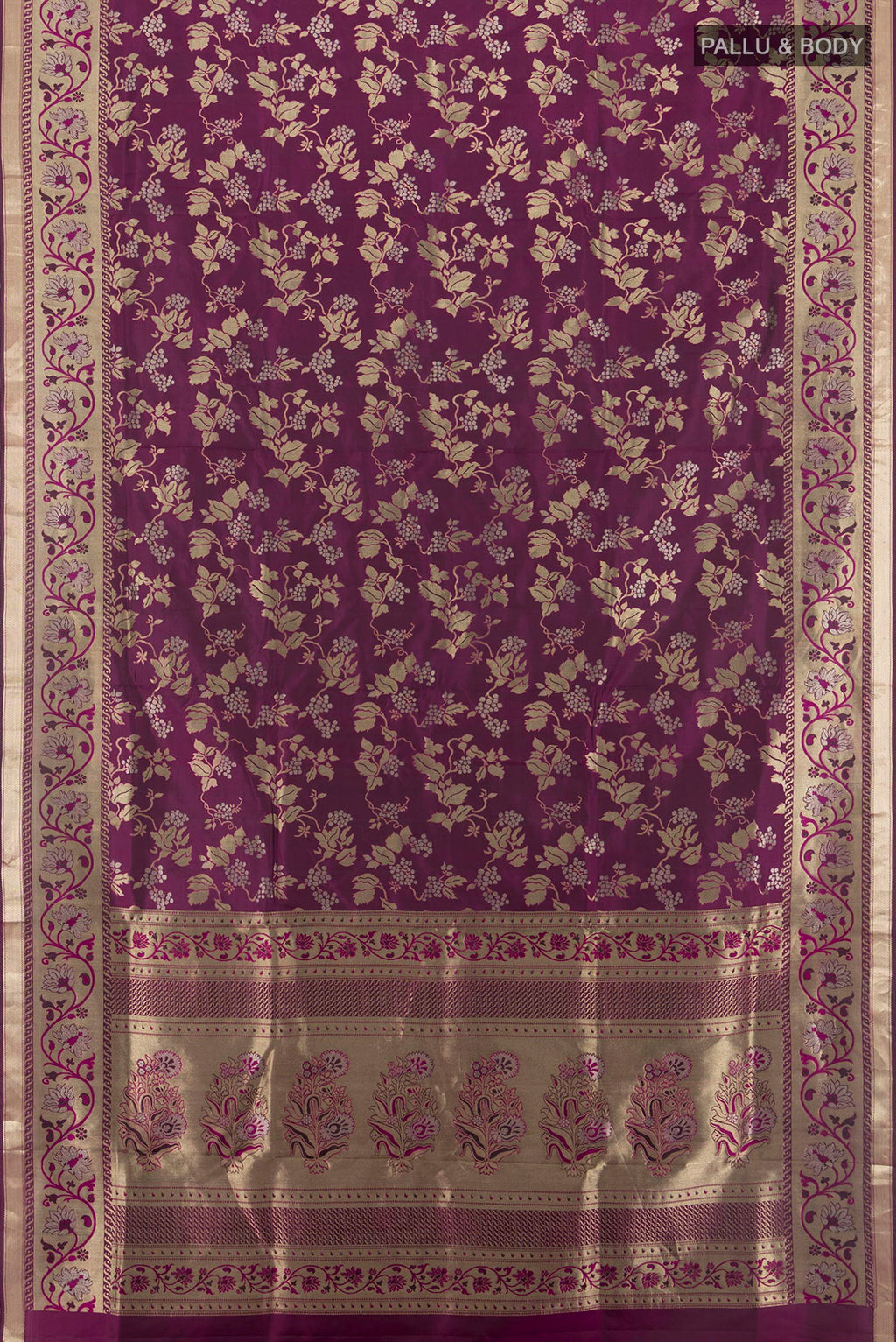 Flat view of Pure Silk Magenta Soft Saree with Zari Brocade on the body and Zari Border. 