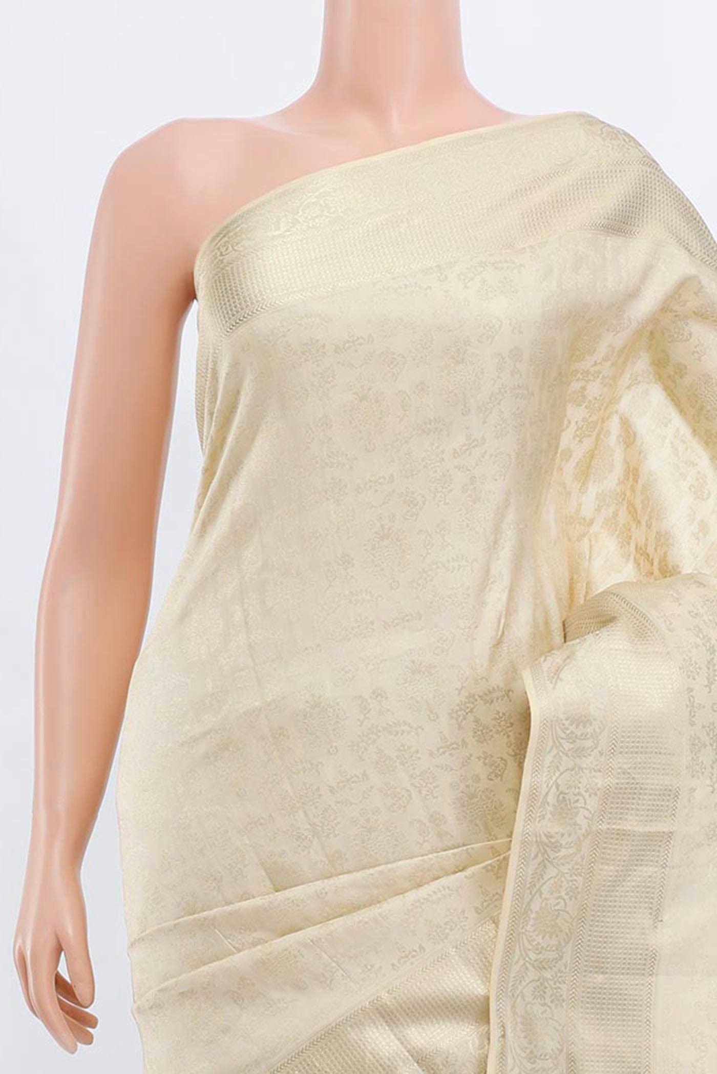 Border image of Cream Soft Silk Saree with Zari Butta on the body and Silk Border. 