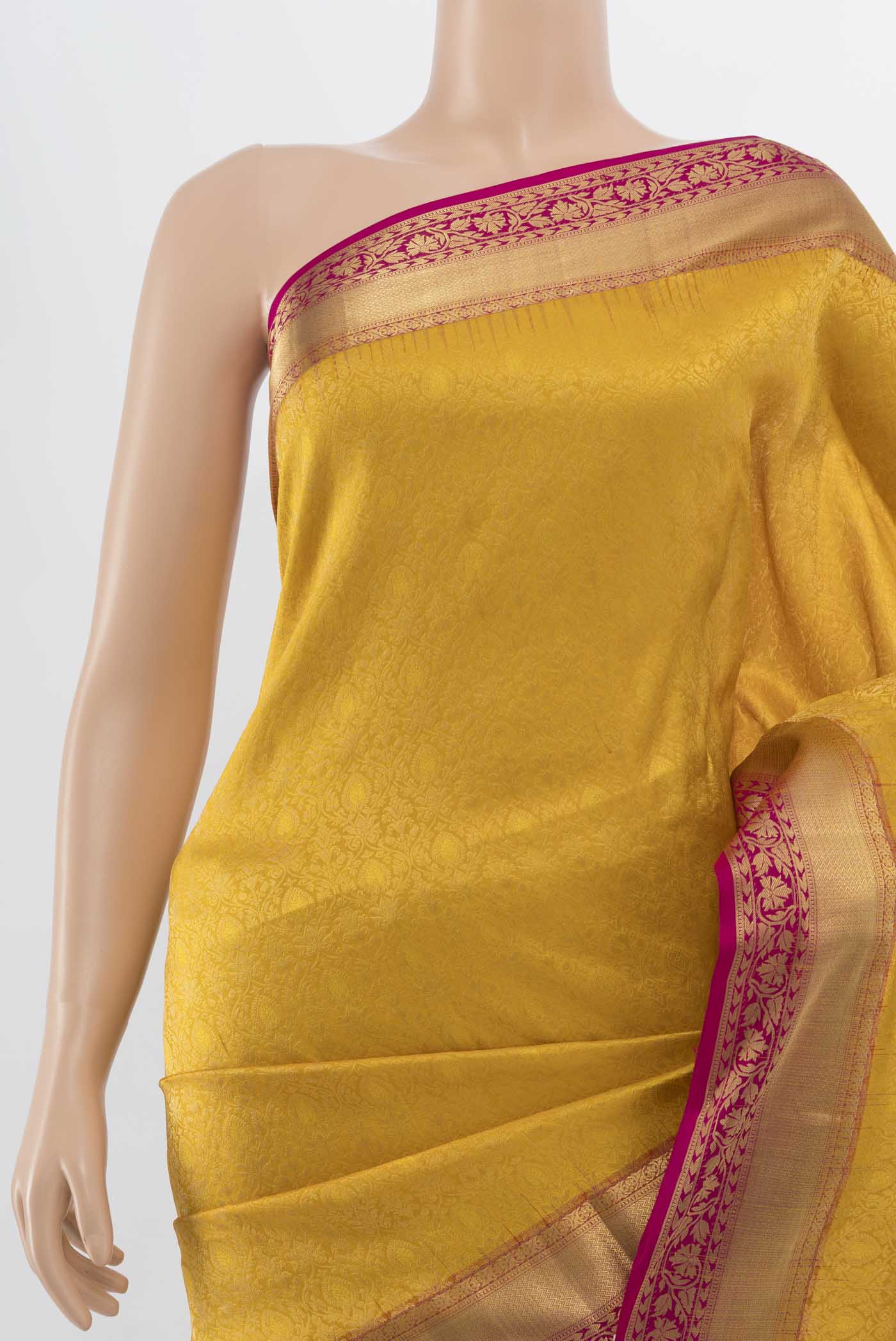 Border image of Yellow Soft Silk Saree with Zari Butta on the body and Silk Border. 