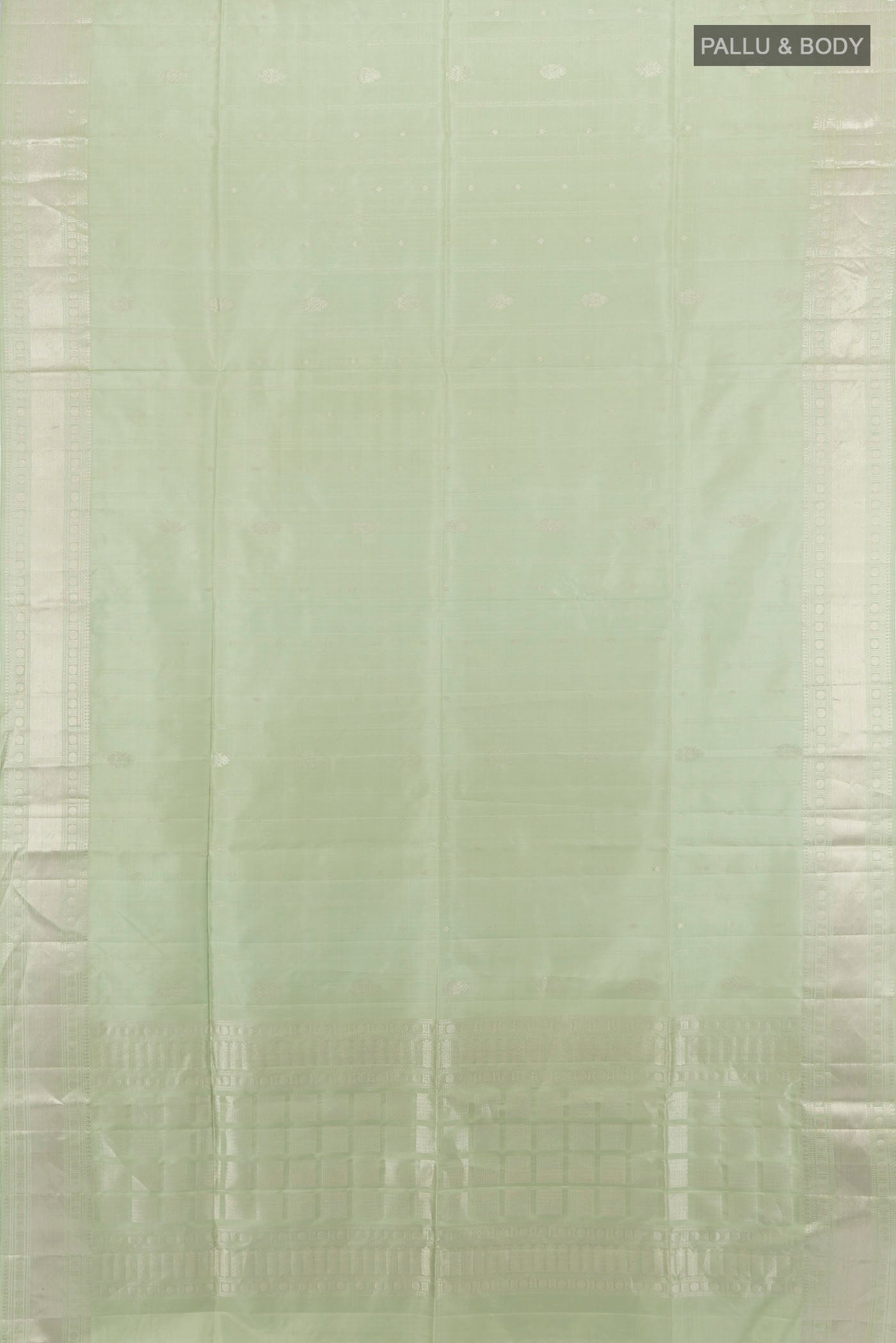 Flat view of Olive Green Soft Silk Saree with Zari Butta on the body and Silk Border. 