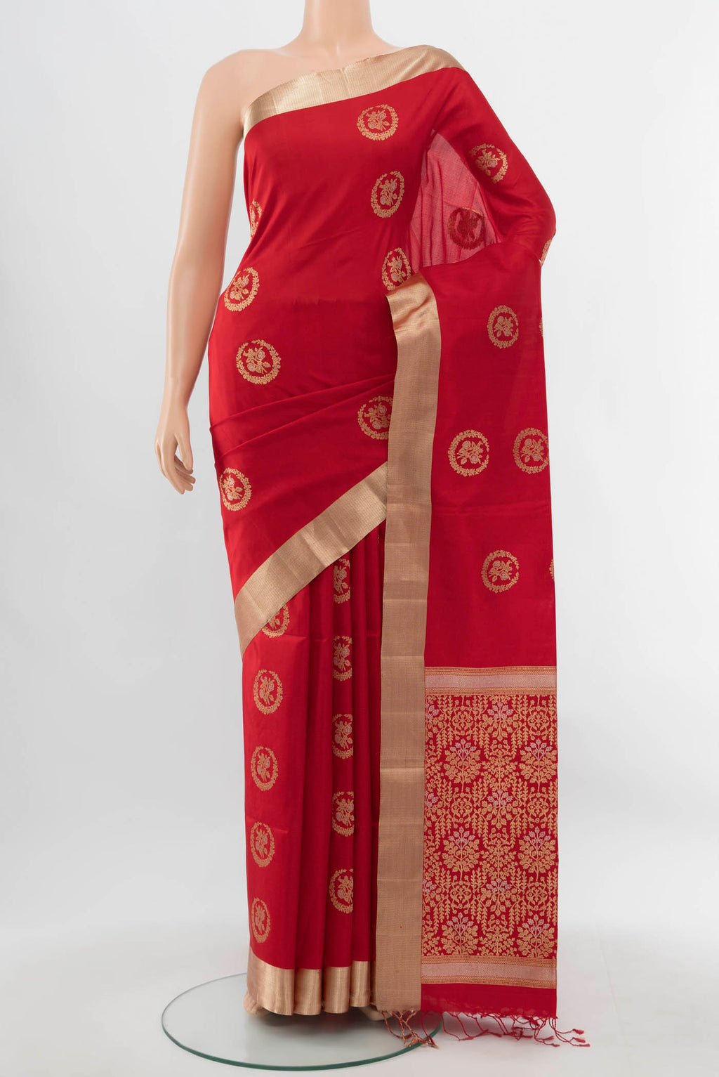 Red Soft Silk Saree with Zari Butta on the body and Silk Border.  displayed on a mannequin