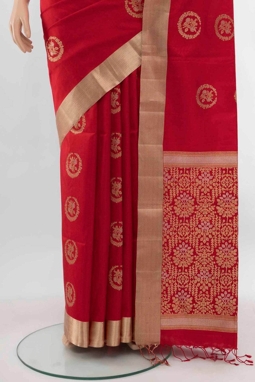 Pleats and pallu of Red Soft Silk Saree with Zari Butta on the body and Silk Border. 