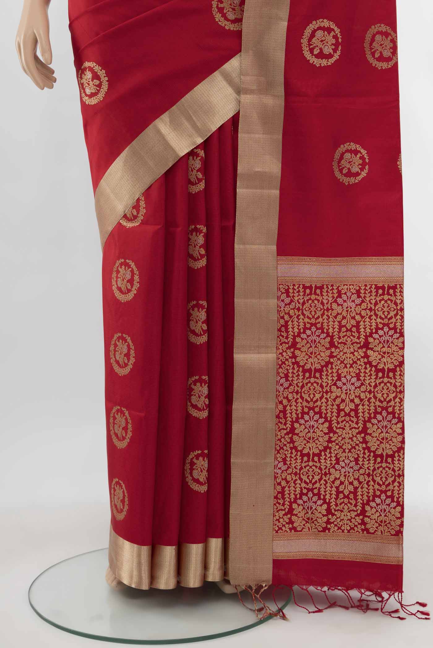 Pleats and pallu of Red Soft Silk Saree with Zari Butta on the body and Silk Border. 