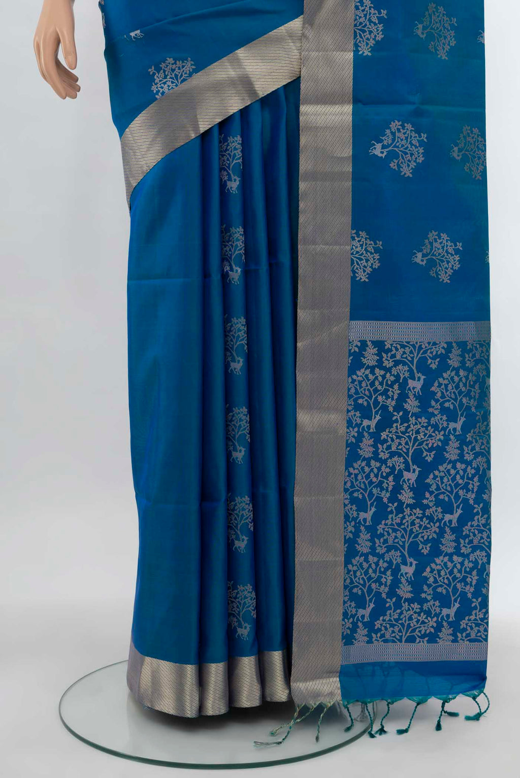 Pleats and pallu of Light Blue Soft Silk Saree with Zari Butta on the body and Silk Border. 