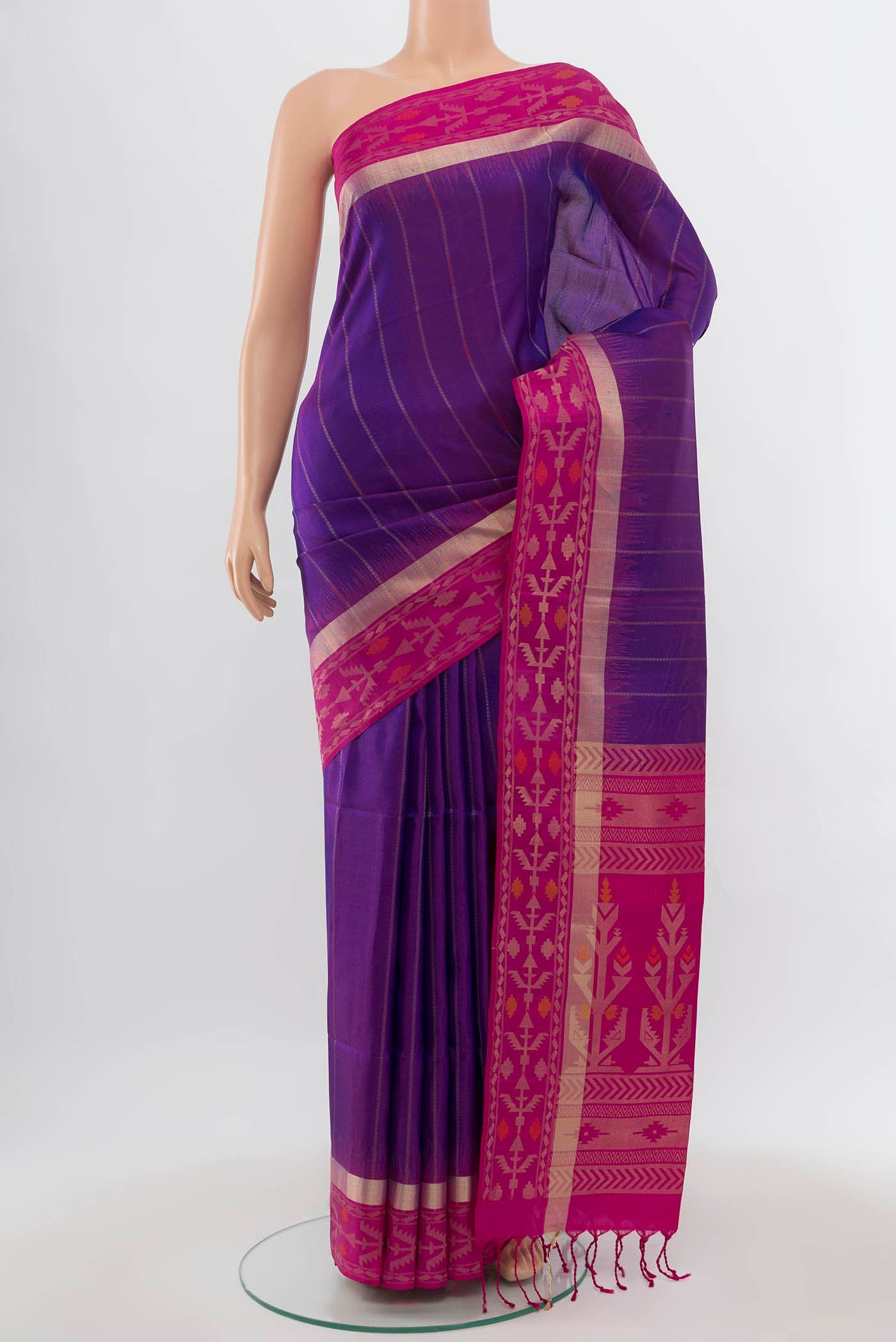 Purple Soft Silk Saree with Zari Butta on the body and Zari Border.  displayed on a mannequin