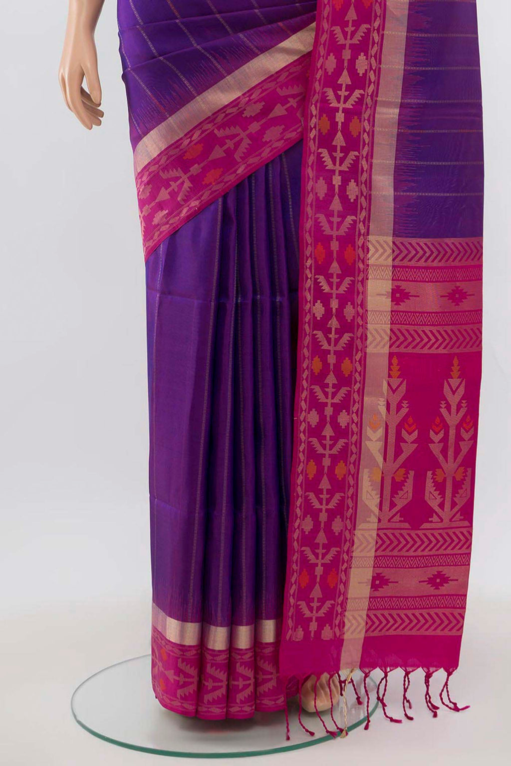 Pleats and pallu of Purple Soft Silk Saree with Zari Butta on the body and Zari Border. 