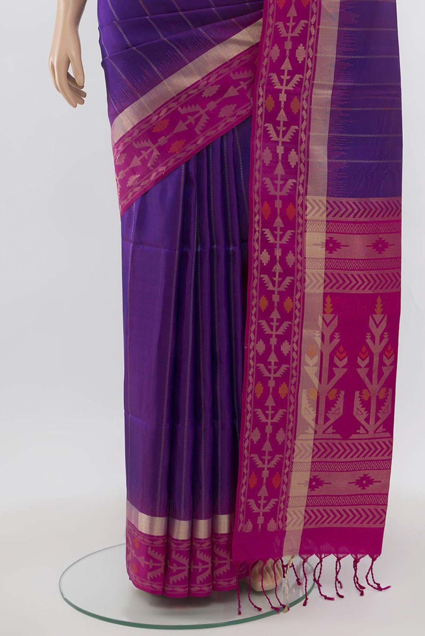 Pleats and pallu of Purple Soft Silk Saree with Zari Butta on the body and Zari Border. 