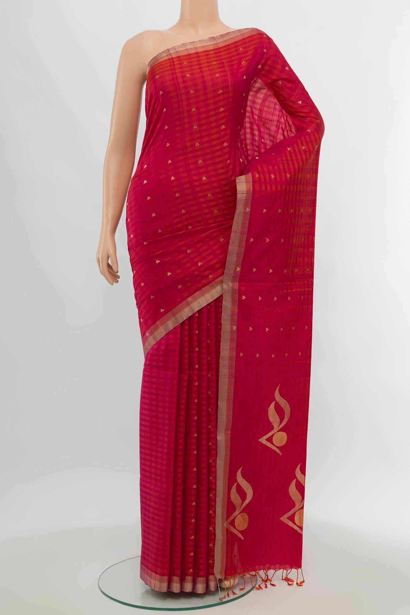 Dark Pink Soft Silk Saree with Zari Butta on the body and Silk Border.  displayed on a mannequin