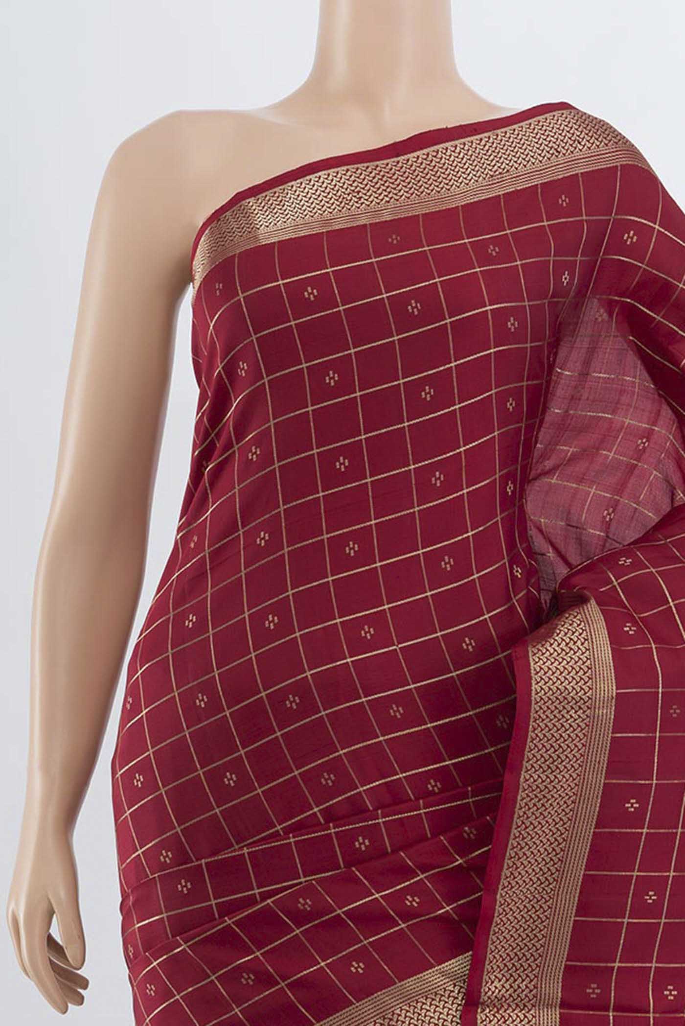 Border image of Maroon Soft Silk Saree with Zari Butta on the body and Silk Border. 