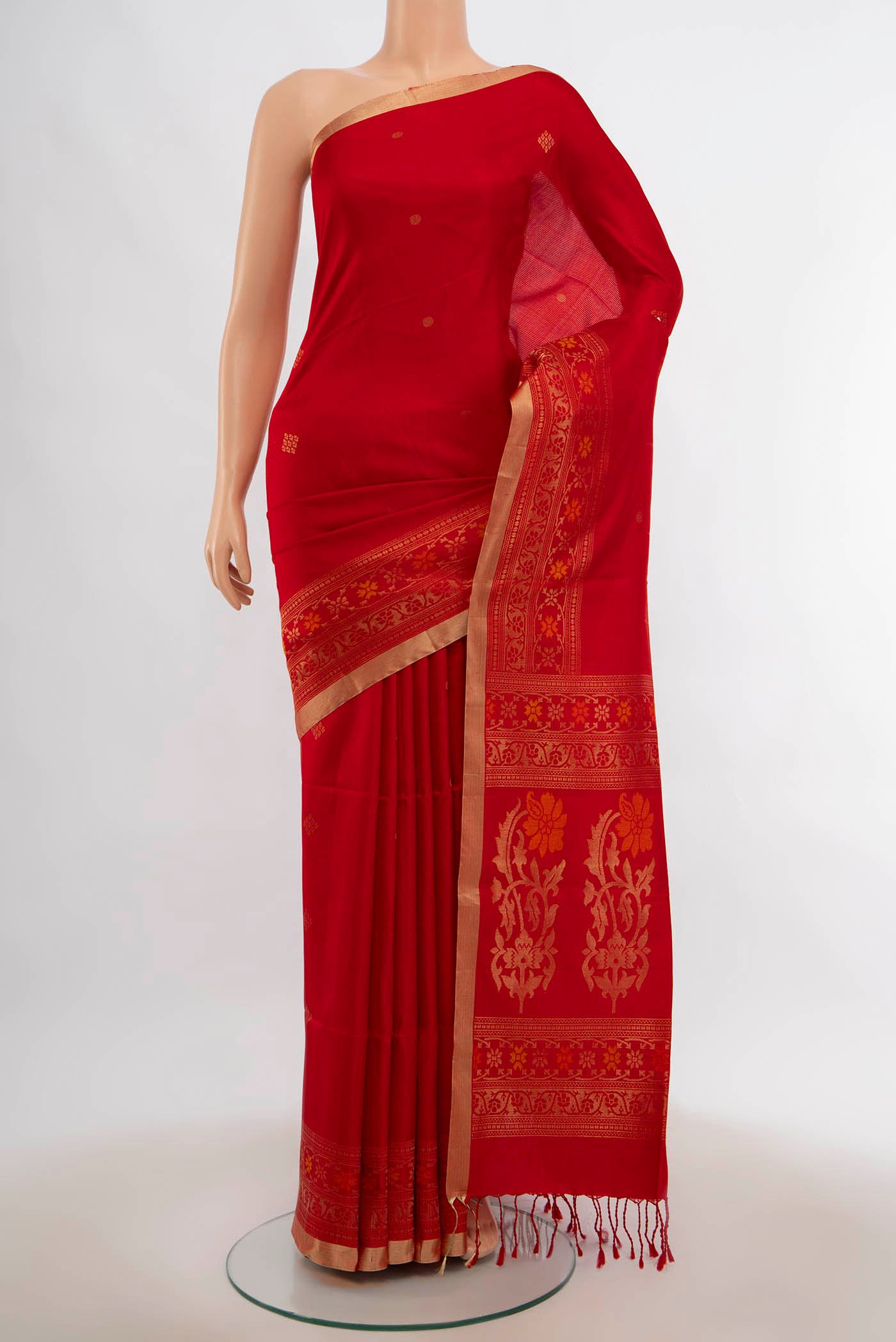 Red Soft Silk Saree with Zari Butta on the body and Silk Border.  displayed on a mannequin