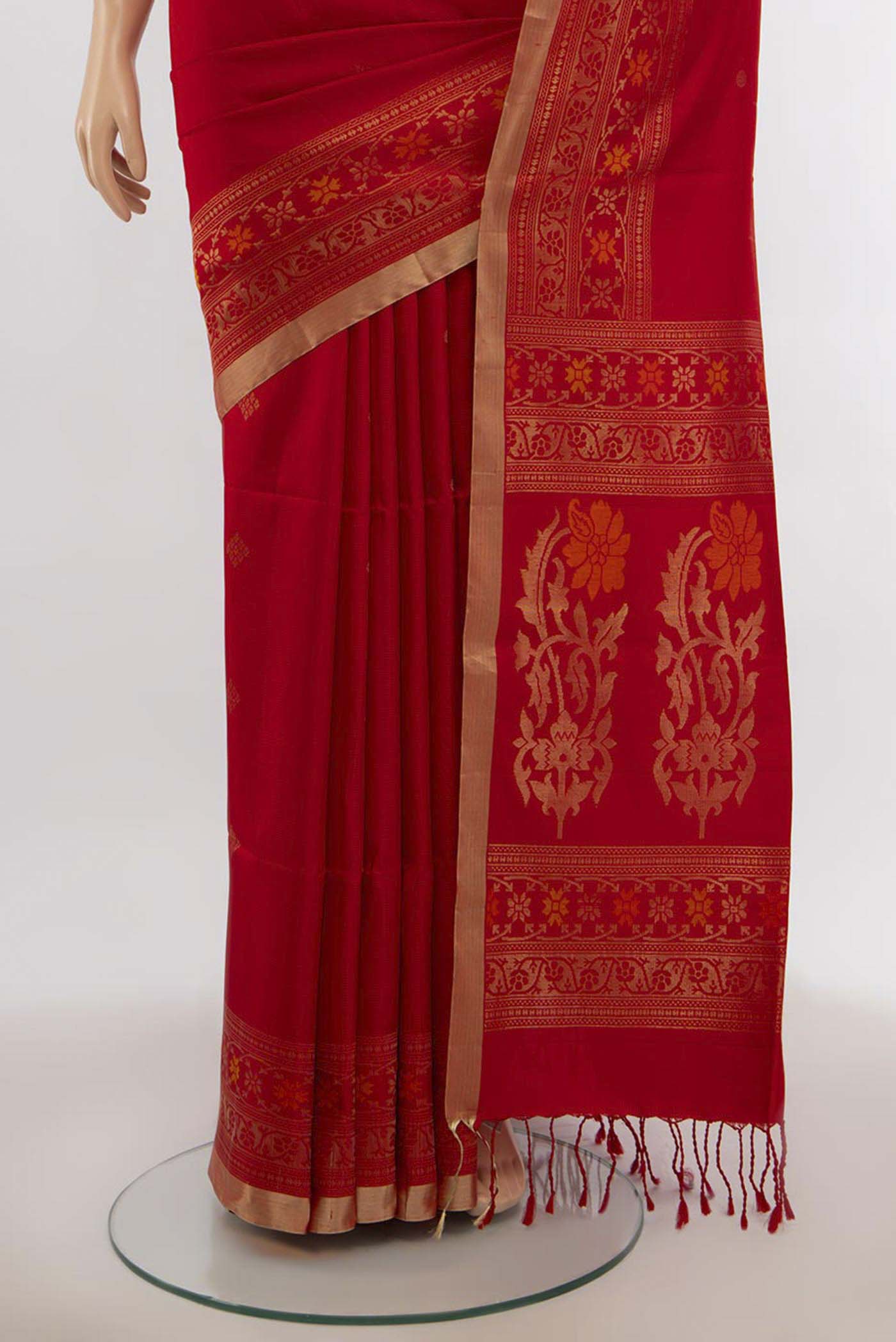 Pleats and pallu of Red Soft Silk Saree with Zari Butta on the body and Silk Border. 