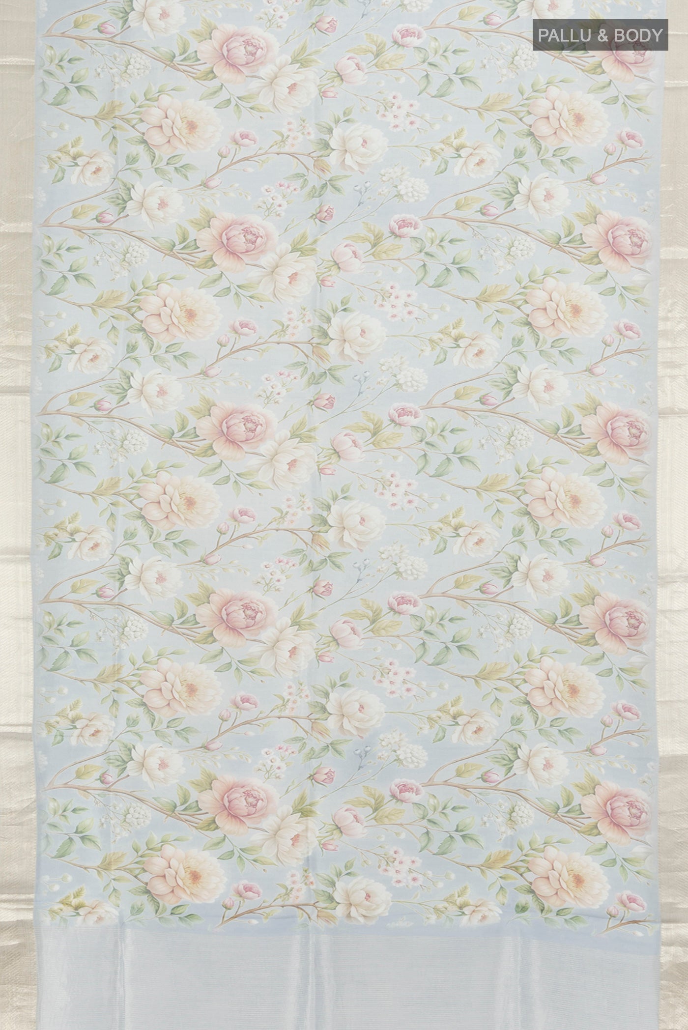 Flat view of Light Blue Organza Silk Saree with Floral Print on the body and Zari Border. 