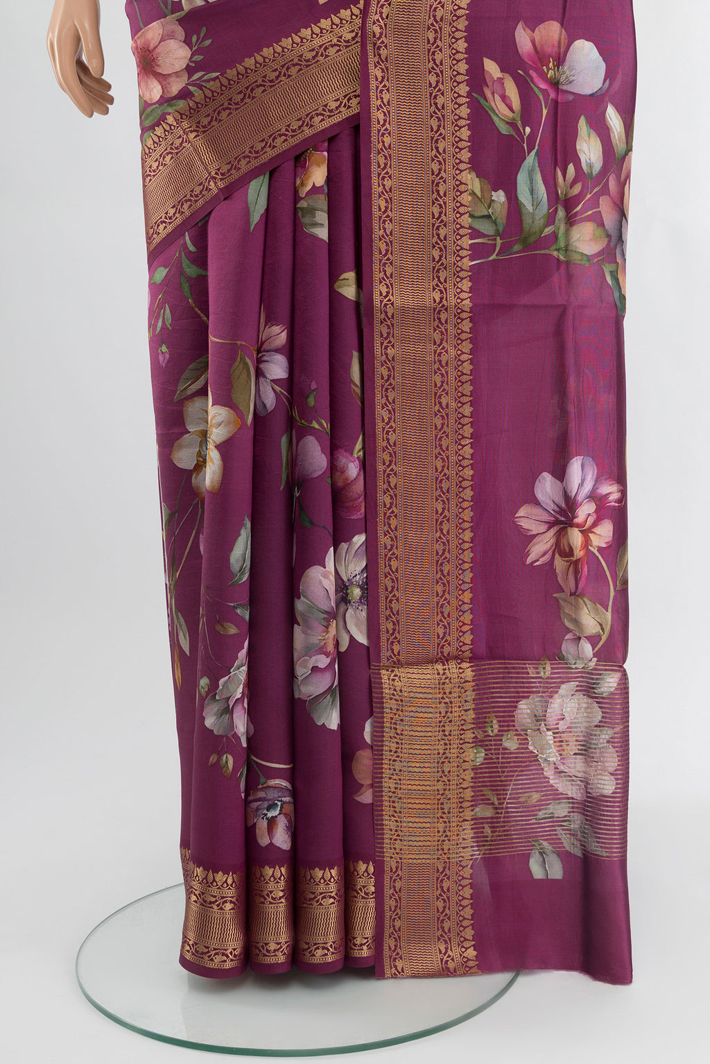 Pleats and pallu of Purple Banarasi Katan Silk Saree with Floral Print on the body and Zari Border. 