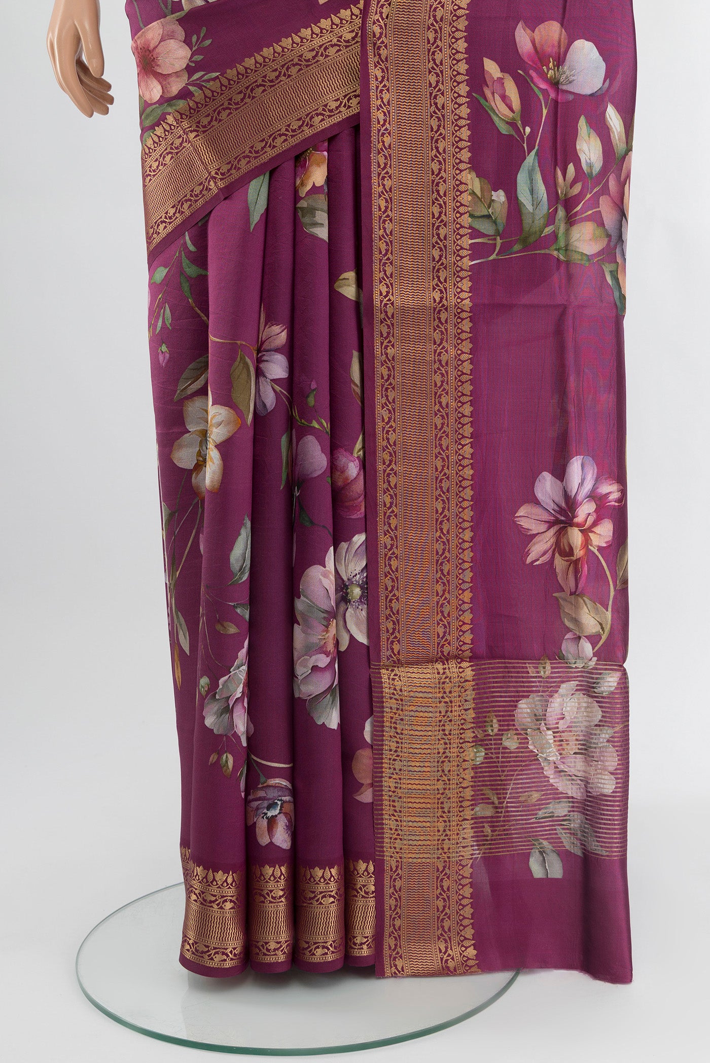 Pleats and pallu of Purple Banarasi Katan Silk Saree with Floral Print on the body and Zari Border. 