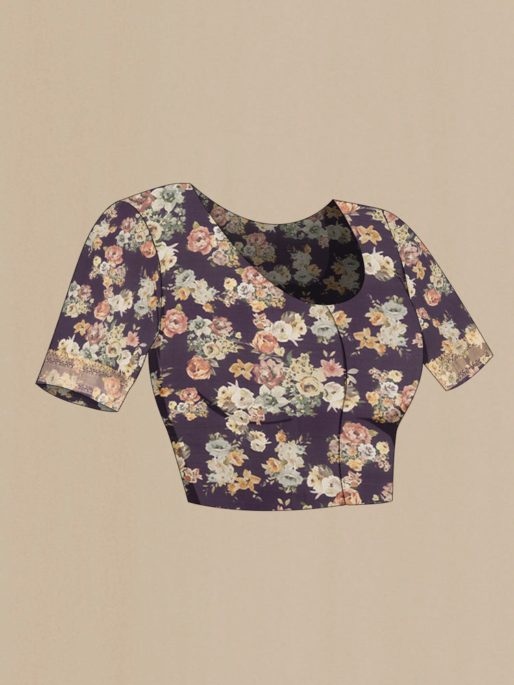 Close up image of the blouse of Navy Blue Banarasi Silk Saree with Floral Print on the body and Fancy Border. 