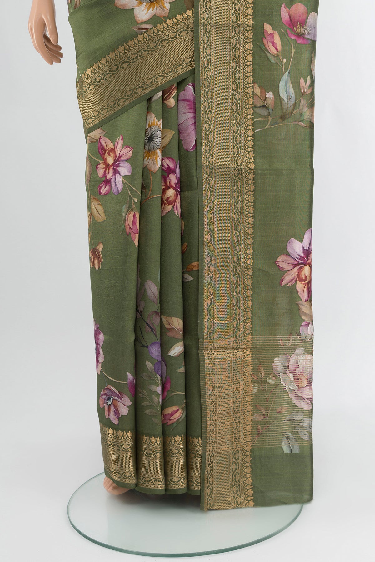 Pleats and pallu of Olive Green Banarasi Katan Silk Saree with Floral Print on the body and Zari Border. 