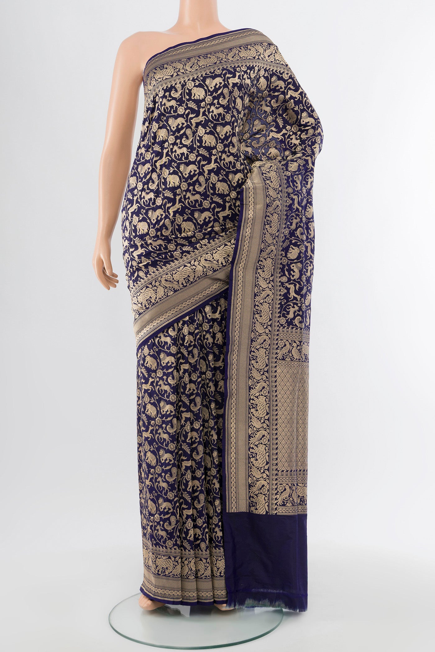 Navy Blue Banarasi Silk Saree with Zari Butta on the body and Silk Border.  displayed on a mannequin