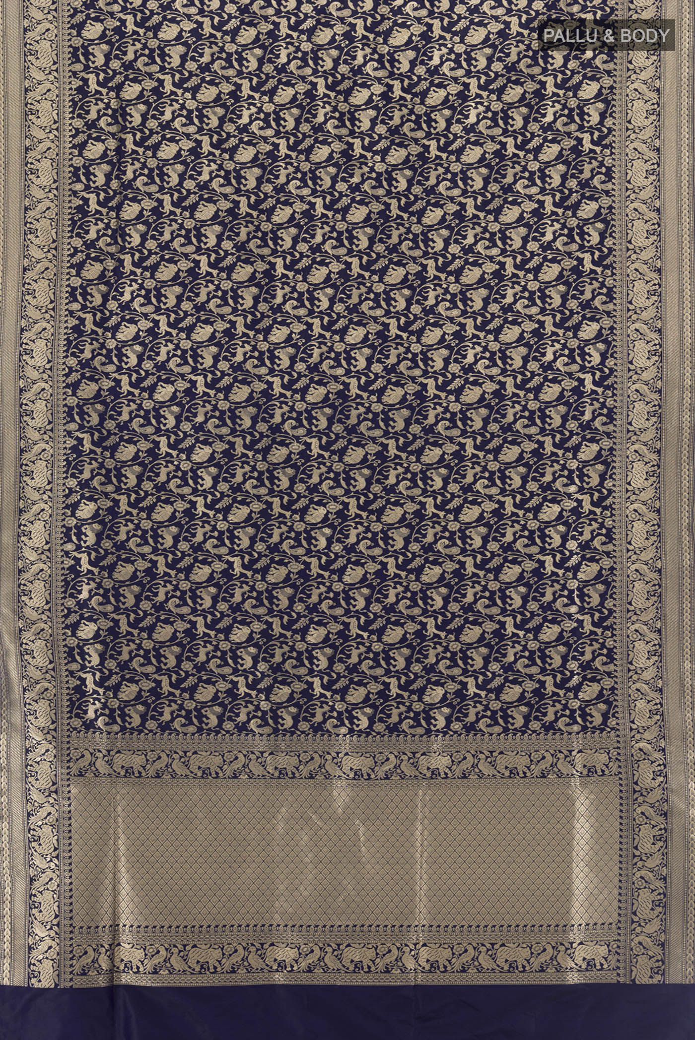 Flat view of Navy Blue Banarasi Silk Saree with Zari Butta on the body and Silk Border. 