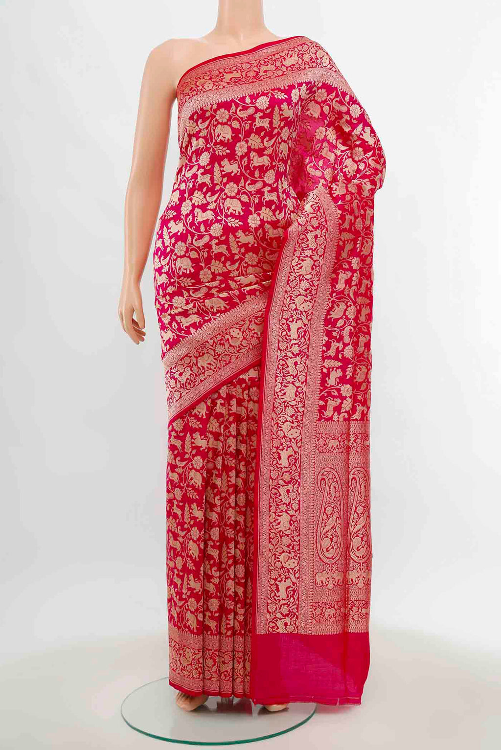 Rani Pink Banarasi Silk Saree with Zari Brocade on the body and Silk Border.  displayed on a mannequin