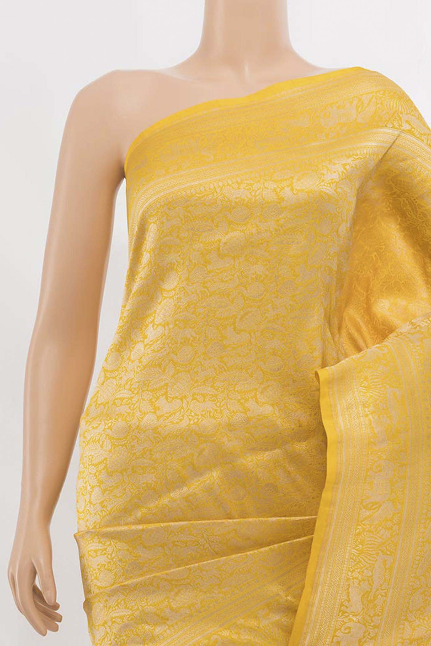 Border image of Yellow Banarasi Silk Saree with Zari Butta on the body and Silk Border. 