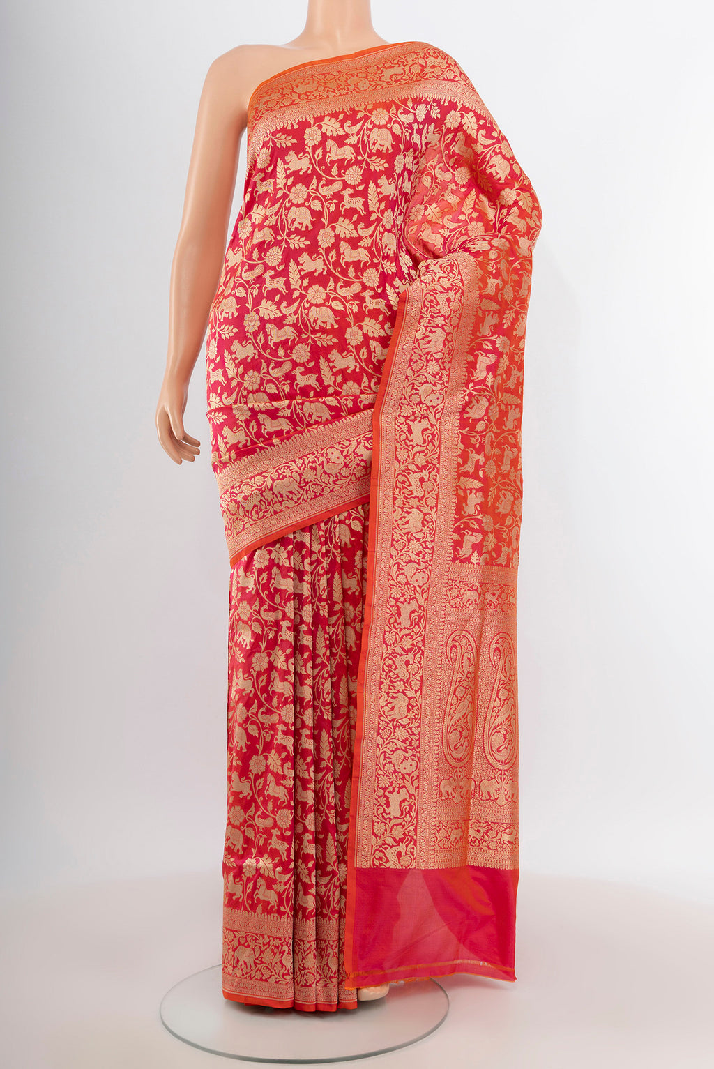 Pink with Orange Color Banarasi Silk Saree with Zari Brocade on the body and Zari Border.  displayed on a mannequin
