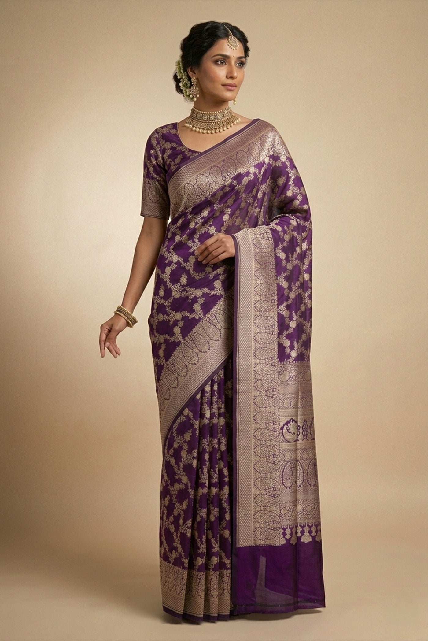 Model wearing a Violet Banarasi Silk Saree with Zari Brocade on the body and Zari Border.