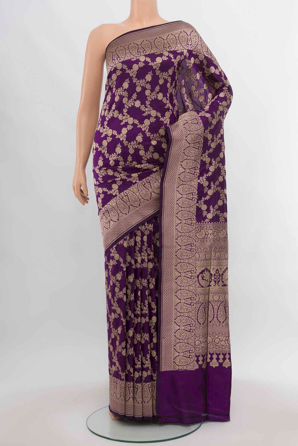 Violet Banarasi Silk Saree with Zari Butta on the body and Silk Border.  displayed on a mannequin