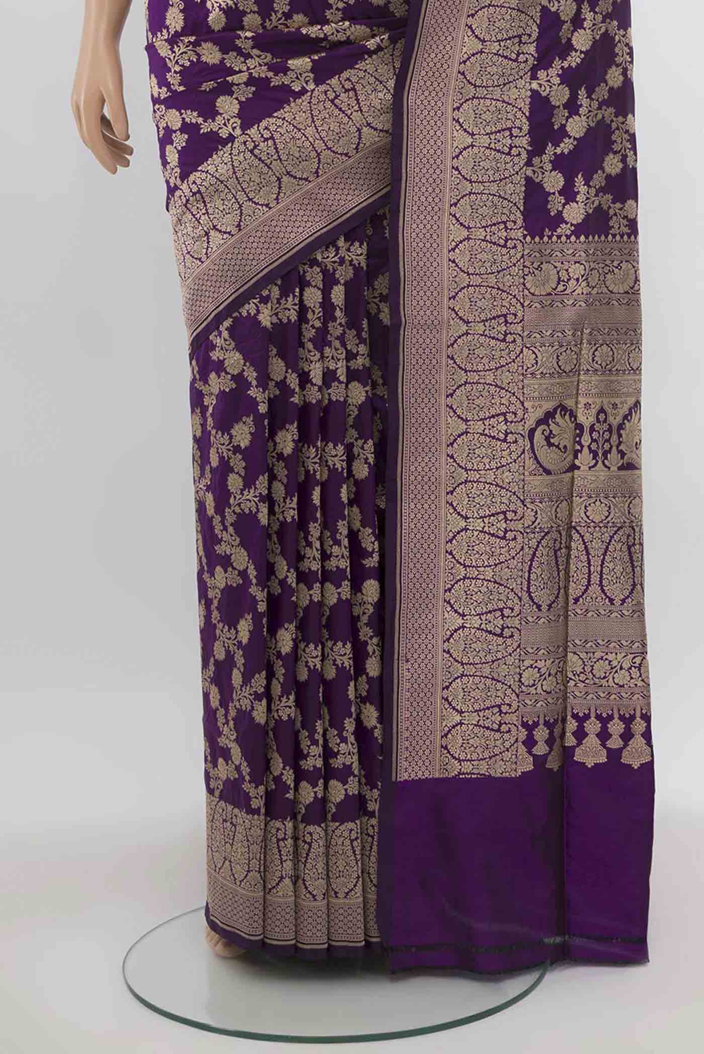 Pleats and pallu of Violet Banarasi Silk Saree with Zari Butta on the body and Silk Border. 