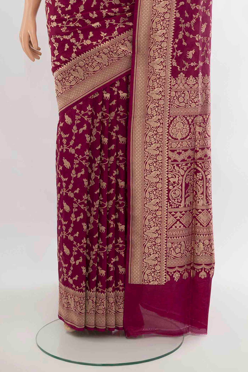 Pleats and pallu of Purple Banarasi Silk Saree with Zari Butta on the body and Silk Border. 