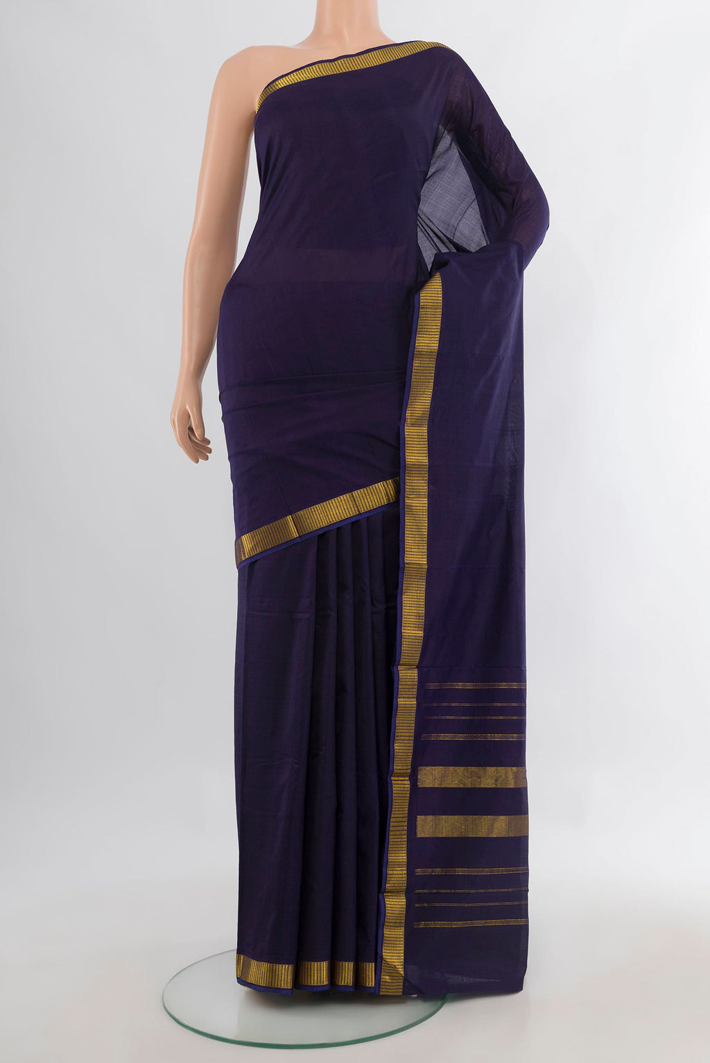 Pure Silk Navy Blue Kanjivaram Saree with Plain Body and Zari Border.  displayed on a mannequin