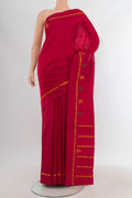 Red Kanchipuram Silk Saree with Plain Body and Zari Border.  displayed on a mannequin