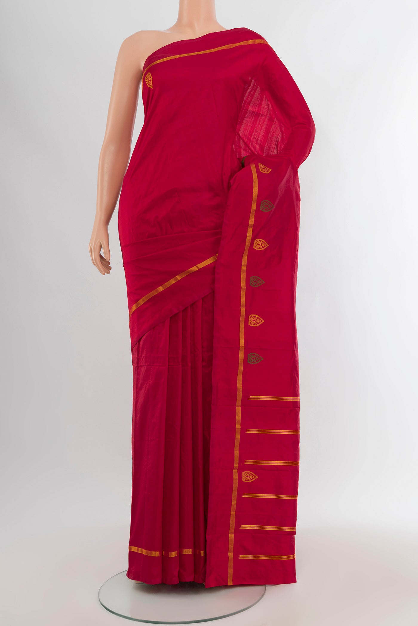 Red Kanchipuram Silk Saree with Plain Body and Zari Border.  displayed on a mannequin