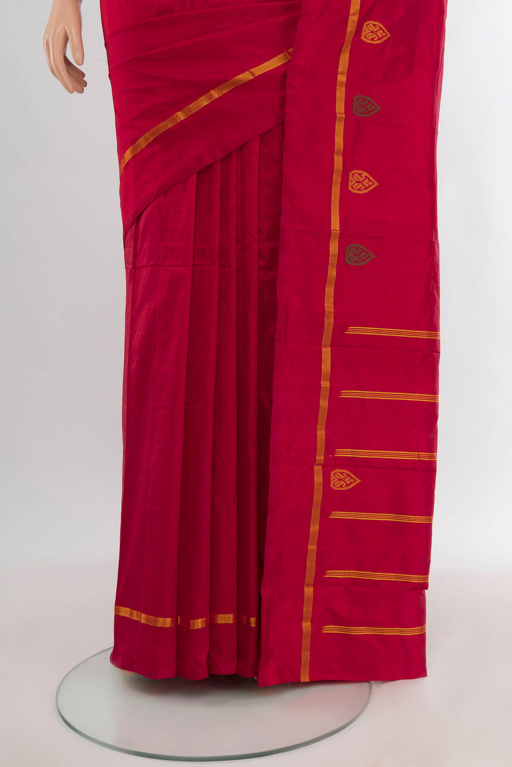 Pleats and pallu of Red Kanchipuram Silk Saree with Plain Body and Zari Border. 
