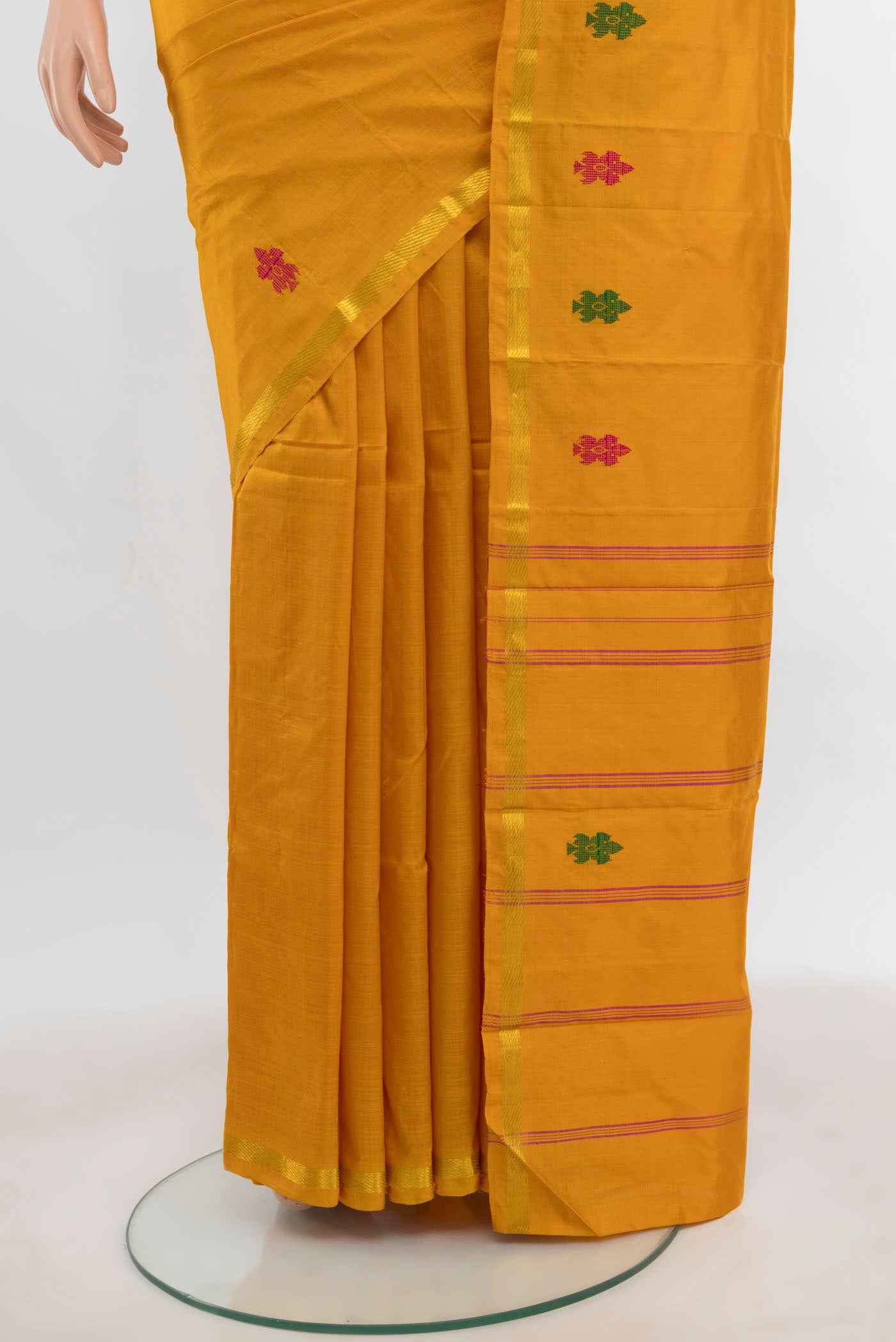 Pleats and pallu of Yellow Kanchipuram Silk Saree with Zari Butta on the body and Silk Border. 