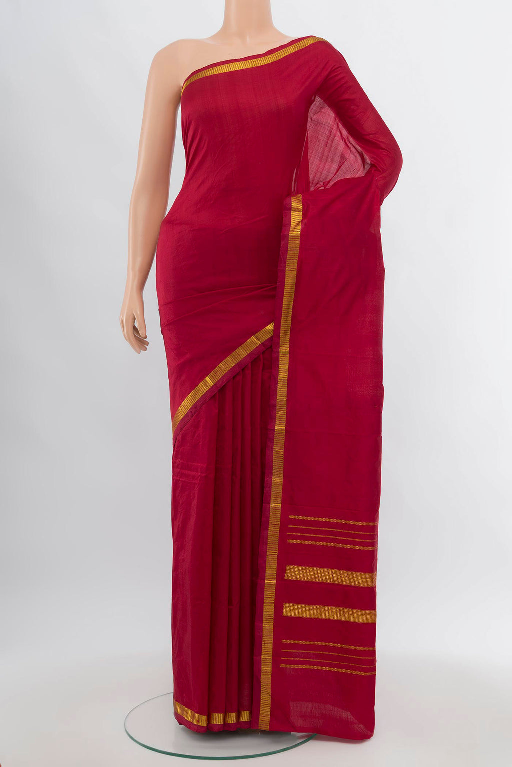 Maroon Kanchipuram Silk Saree with Plain Body and Silk Border.  displayed on a mannequin