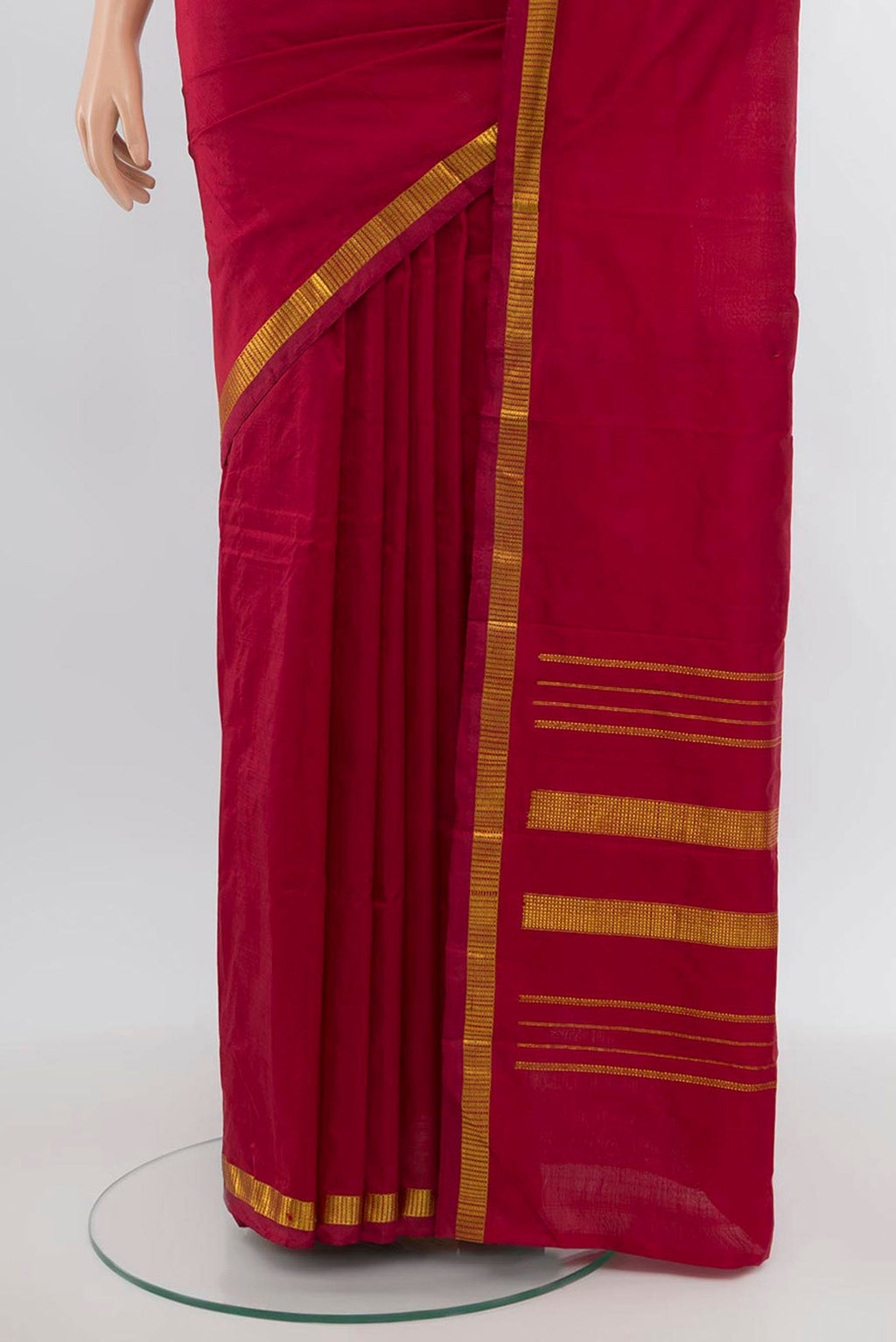 Pleats and pallu of Maroon Kanchipuram Silk Saree with Plain Body and Silk Border. 