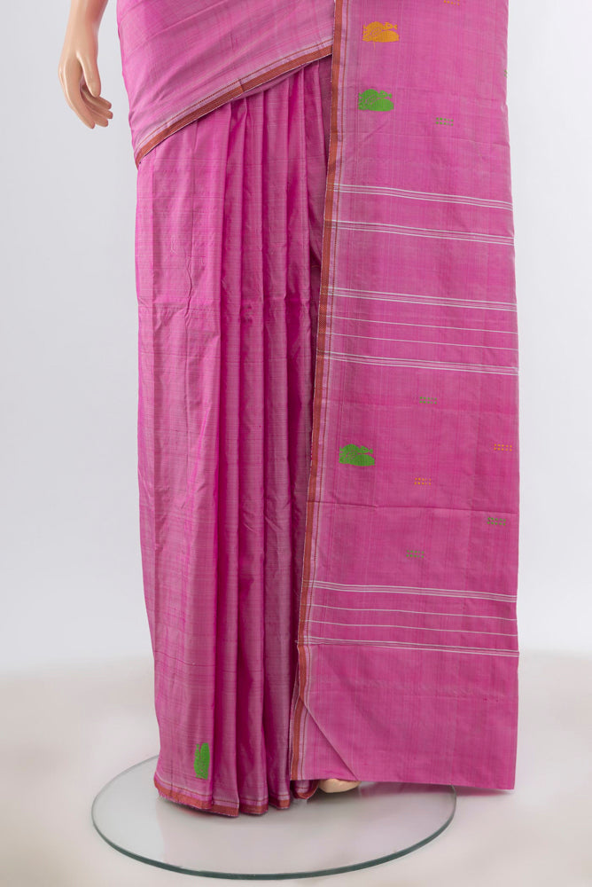 Pleats and pallu of Magenta Kanchipuram Silk Saree with Plain Body and Silk Border. 