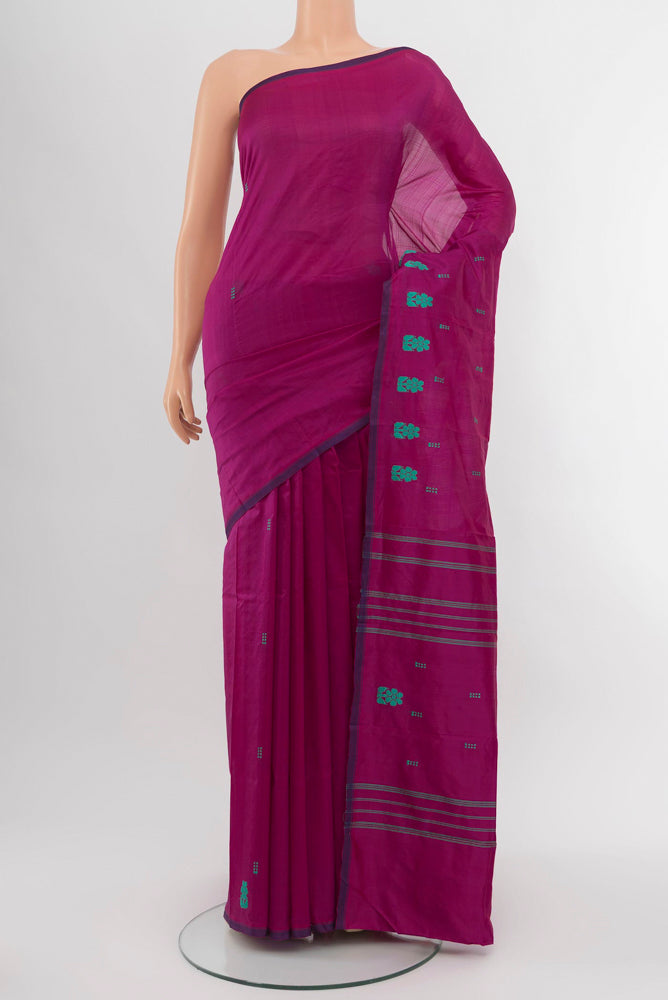 Purple Kanchipuram Silk Saree with Thread Butta on the body and Silk Border.  displayed on a mannequin