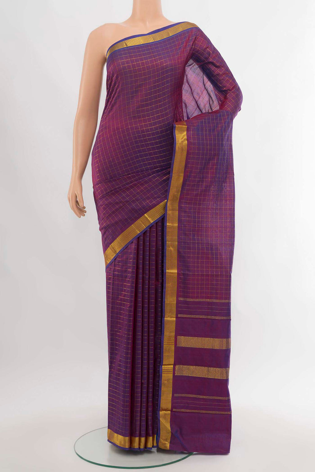 Purple Kanchipuram Silk Saree with Zari Butta on the body and Silk Border.  displayed on a mannequin