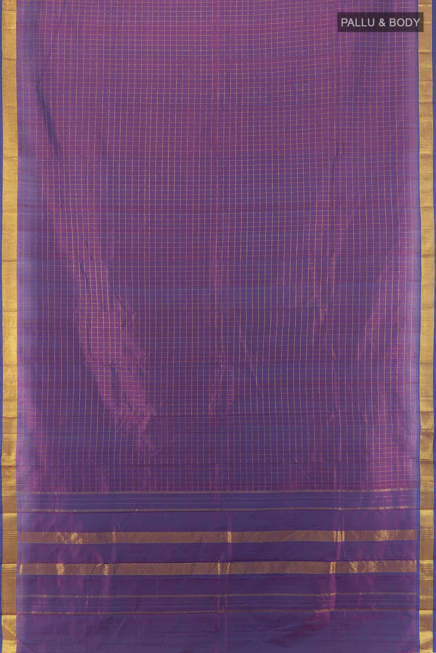 Flat view of Purple Kanchipuram Silk Saree with Zari Butta on the body and Silk Border. 