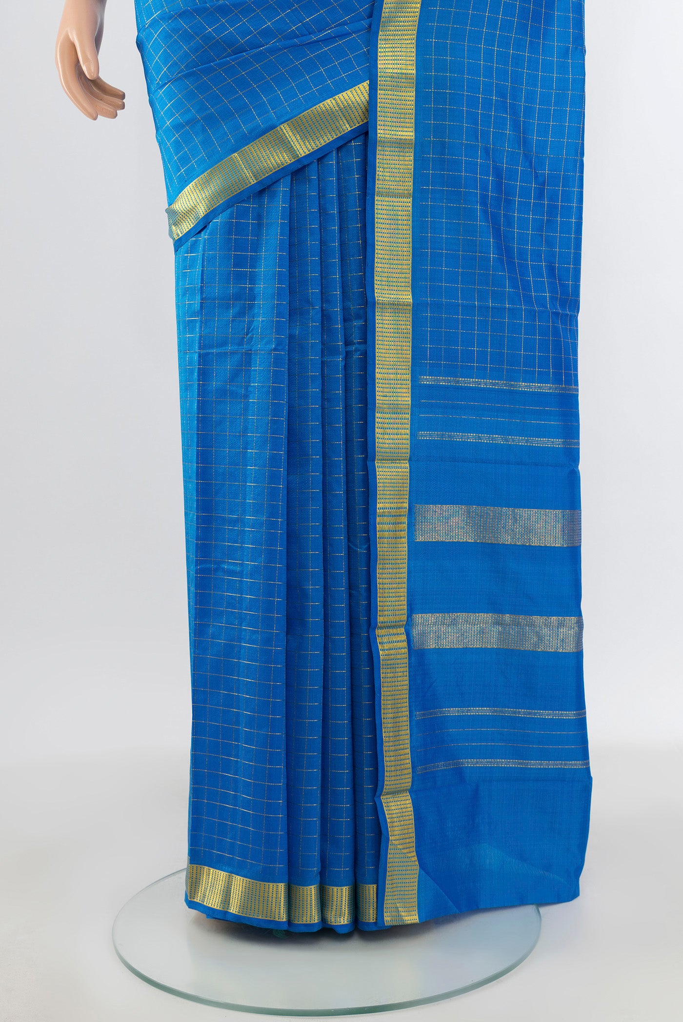 Pleats and pallu of Royal Blue Kanchipuram Silk Saree with Checked design on the body and Zari Border. 