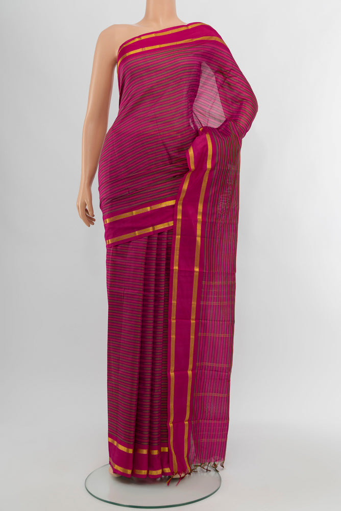 Maroon Kanchipuram Silk Saree with Checked design on the body and Silk Border.  displayed on a mannequin
